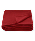 Blanket with embroided badge and initials